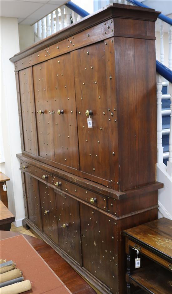 A large Swiss or Austrian chestnut cupboard W.212cm approx.